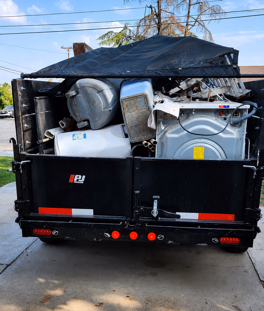 Brush and yard debris loaded for removal from a property